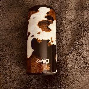 Swig skinny can cow print coozie